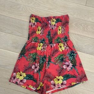 Coral & Reef floral romper.  Smocked top. Shorts bottom.  Size 12. Like new.